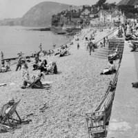 Holidaymakers On The Beach At Sidmouth Devon.