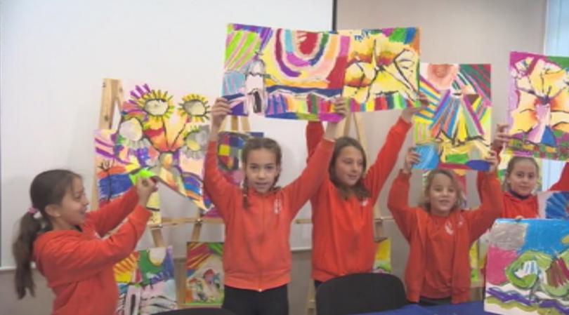 young students sell their artwork help children battling cancer