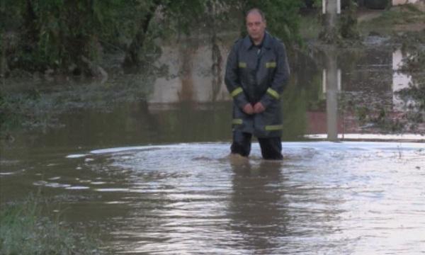 over houses flooded after torrential rain